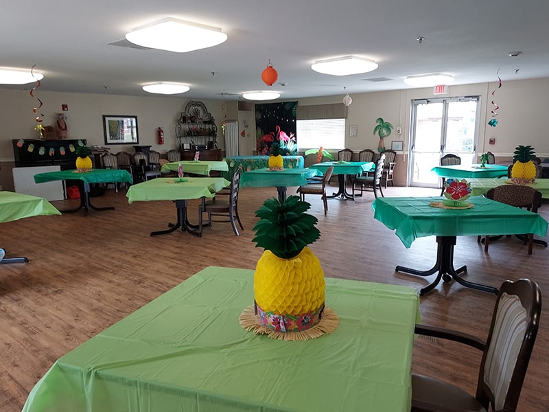 Luau activity table decorations at Edgefield Post Acute