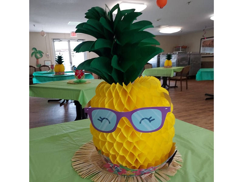 Luau activity table decorations at Edgefield Post Acute